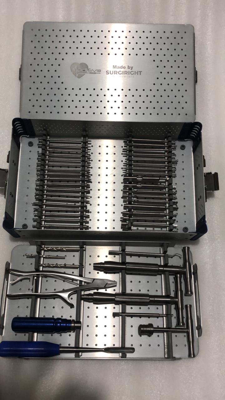Stainless steel surgical instrument set and sterilization container tray branded by Surgiright